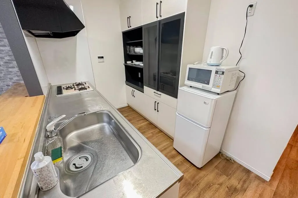 Image 2 of 万博会場まで直通2駅10分USJ海遊館近い 朝潮橋駅徒歩4分無料駐車場有り最大12名宿泊可能 Wifi ベビー用品充実
